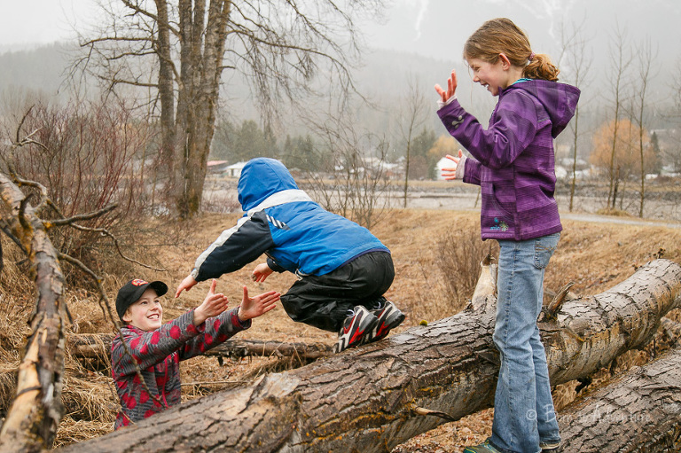 Kids Jumping off Log