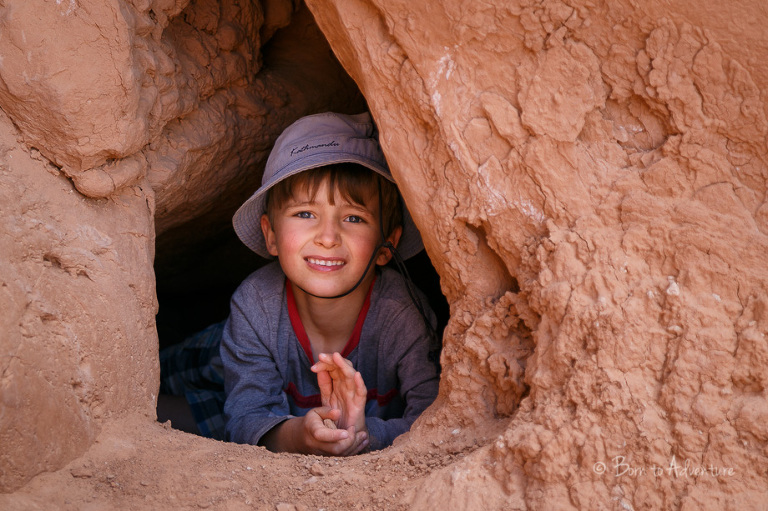kid in cave at Goblin State Park