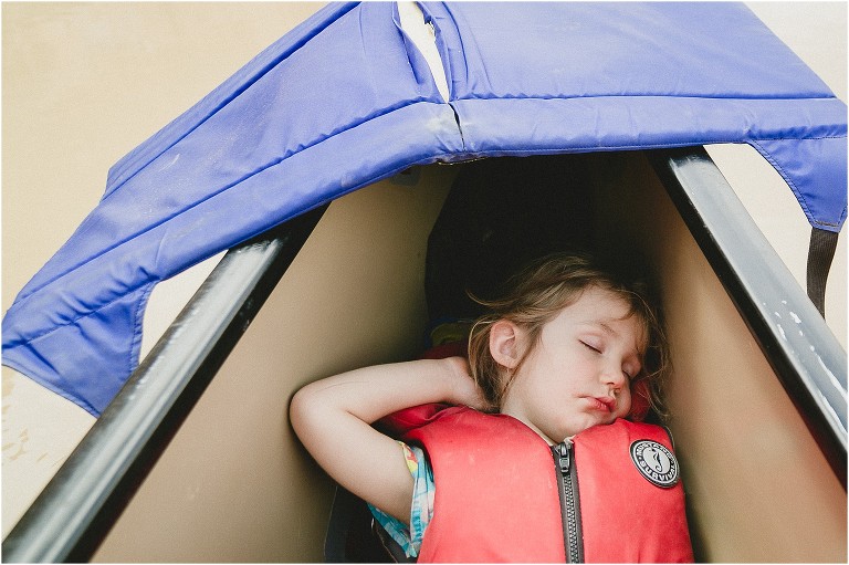 Child sleeping in Canoe