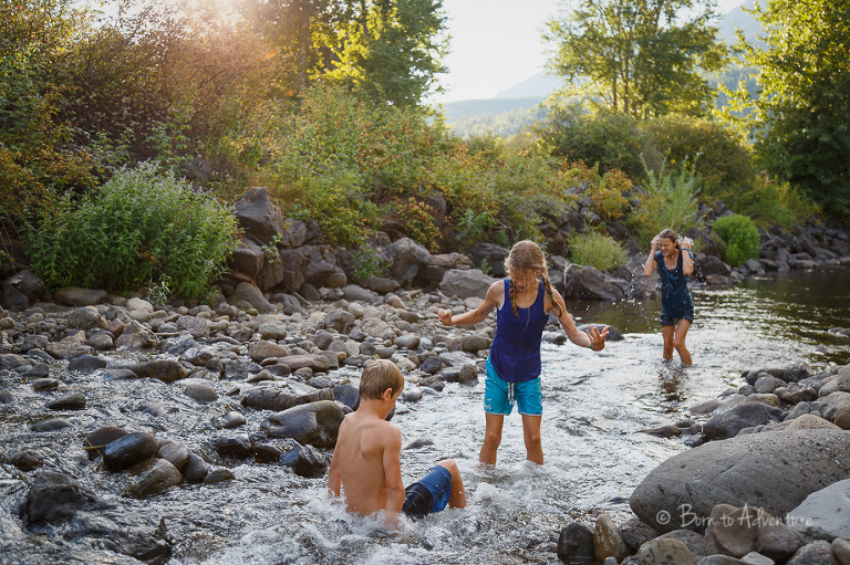 kids playing in creek