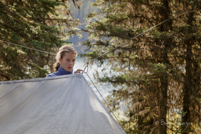 Setting up a tarp of camping