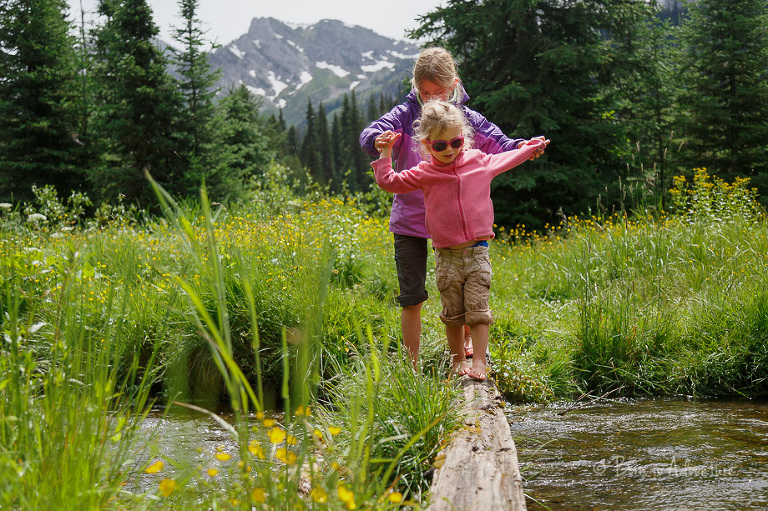 Kids walking log at Island Lake Lodge Fernie
