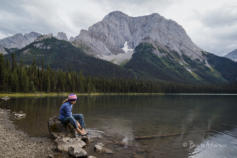 Girl sitting beside Lower Elk Lake