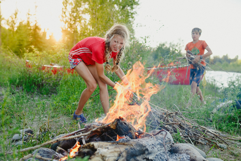 Kids lighting a fire